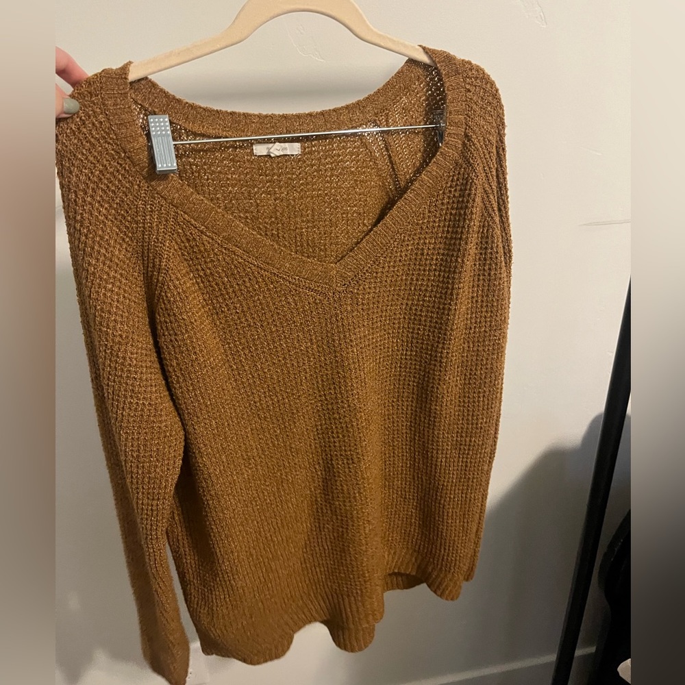 Orange Maurice’s sweater